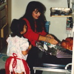 Helena cooking with Rachel when she was little